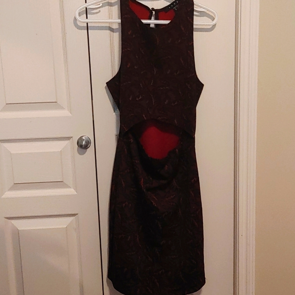 Womans dress With Cut Out On Belly